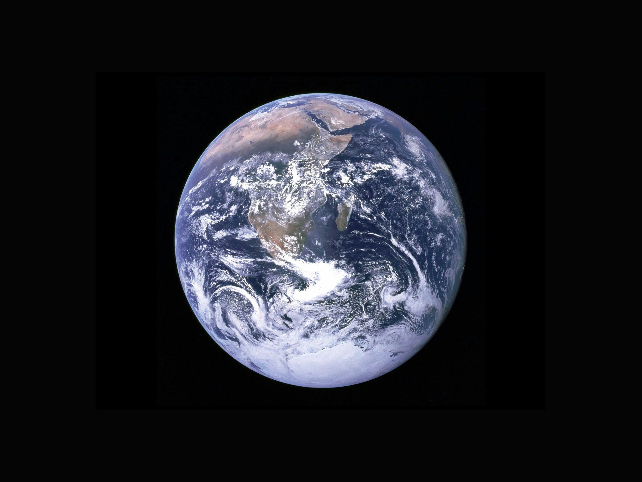 View of the Earth as seen by the Apollo 17 crew traveling toward the moon. The future view the first settlers on the Moon will have. Human rights in space